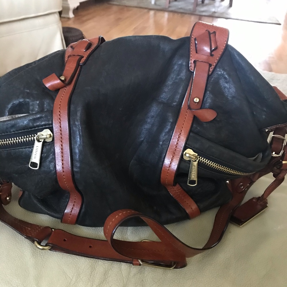 - Black LeatherGrayson bag with brown accent